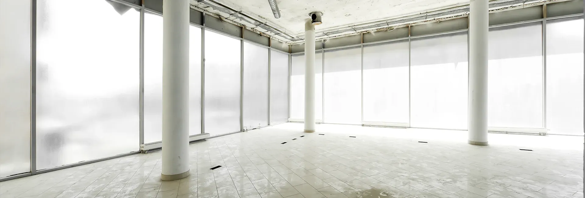 Empty, newly finished space with large windows